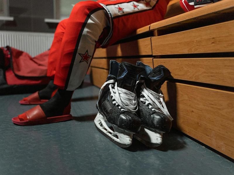 Close up of sports equipment in a minimalist room.
